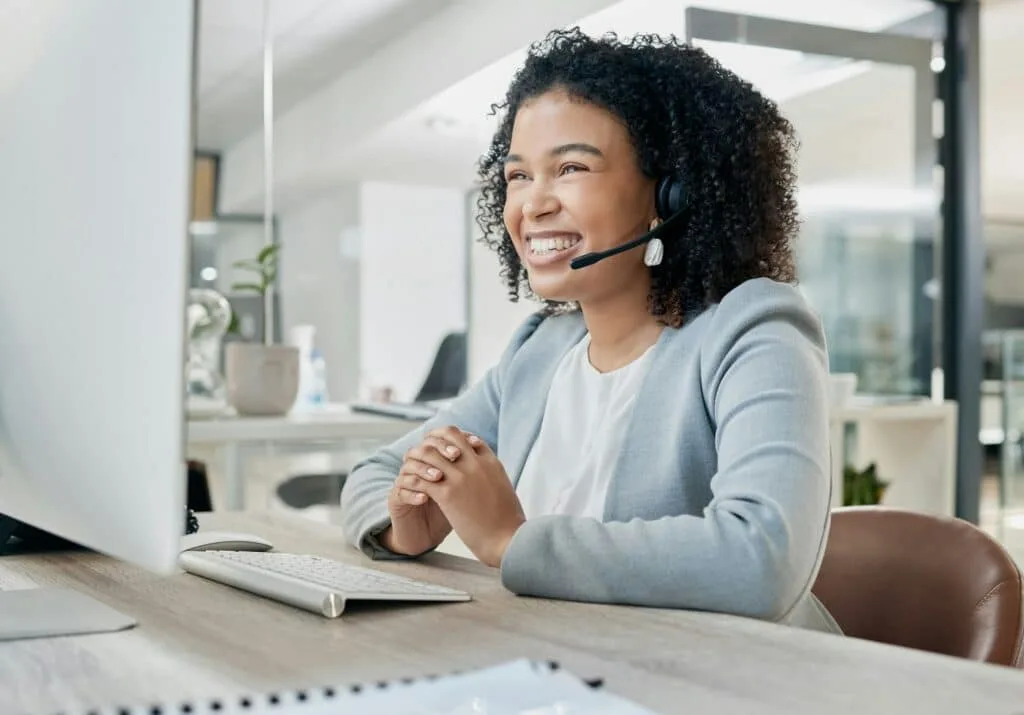 Industrial Filtration Solutions 21 Black woman, call center and computer with CRM and contact us, phone call with customer service or